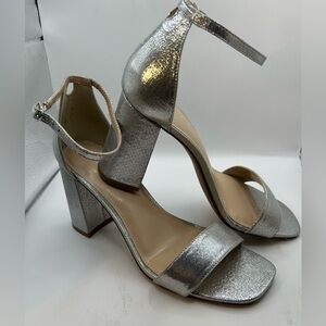 🎉NWOT Kelly & Katie heels.  Shimmering silver metallic. Size 10. Never wo…